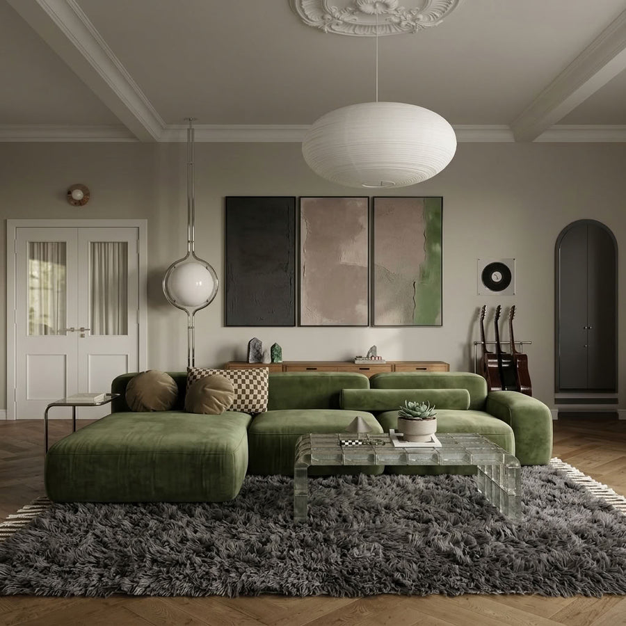 Charcoal Beni Ourain rug in modern living room under green sectional sofa