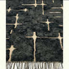 Charcoal and ivory Mrirt rug Itriwen wool texture detail