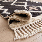 Rolled corner showing pile construction and fringe detail of ivory twisted wool