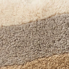 Close-up of the tonal bands pattern on the Tilelli Moroccan wool pillow