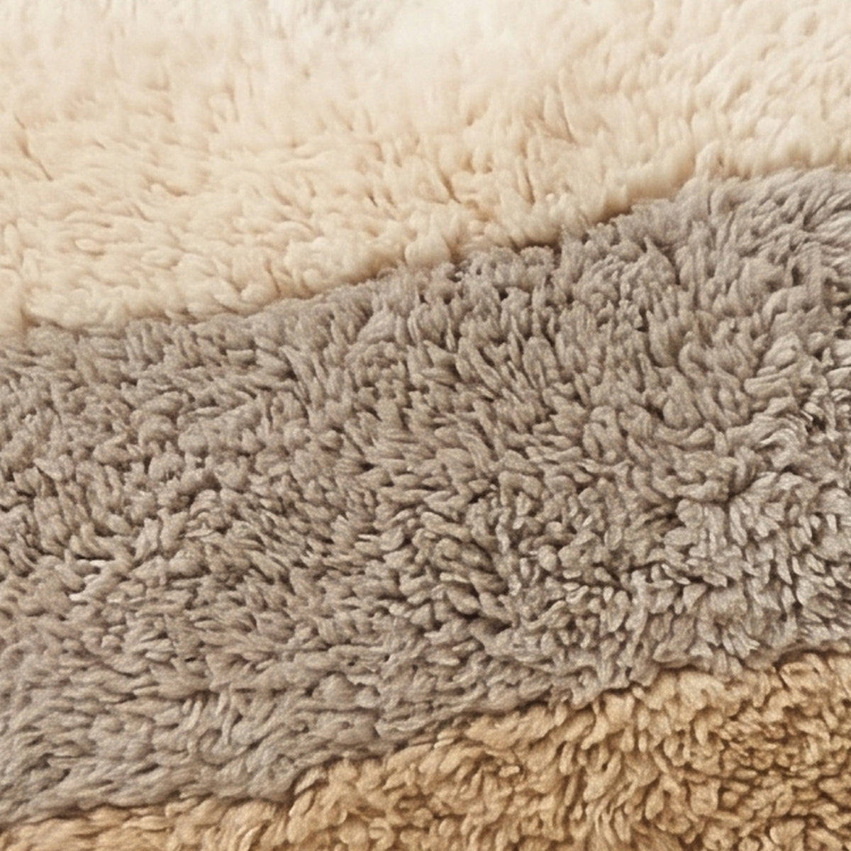 Close-up of the tonal bands pattern on the Tilelli Moroccan wool pillow