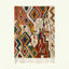 Full view of the Asifran Boujaad rug in cream, terracotta, forest green, mustard and navy with layered diamond lattice motifs