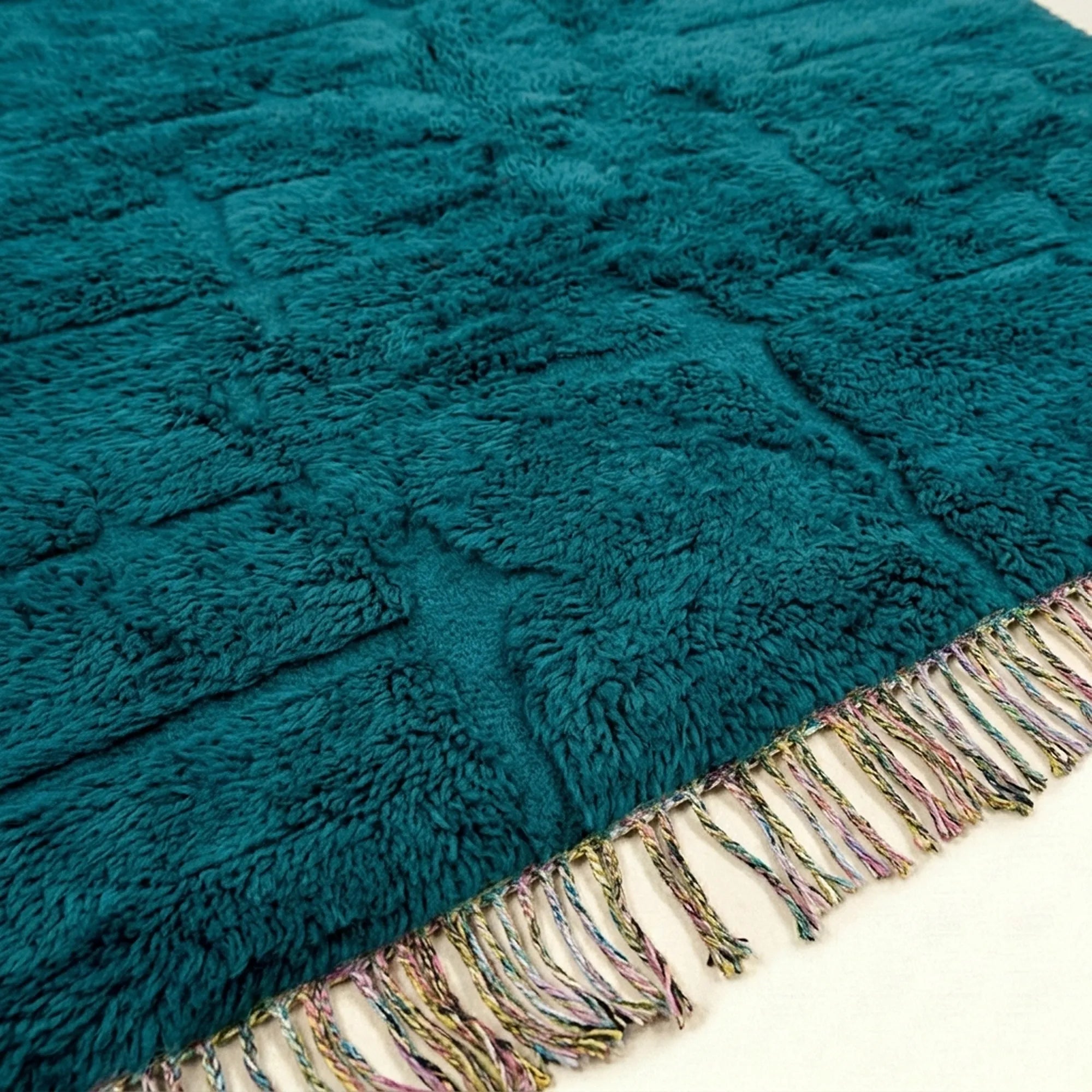 Deep teal Mrirt rug Tayriq pile and fringe detail