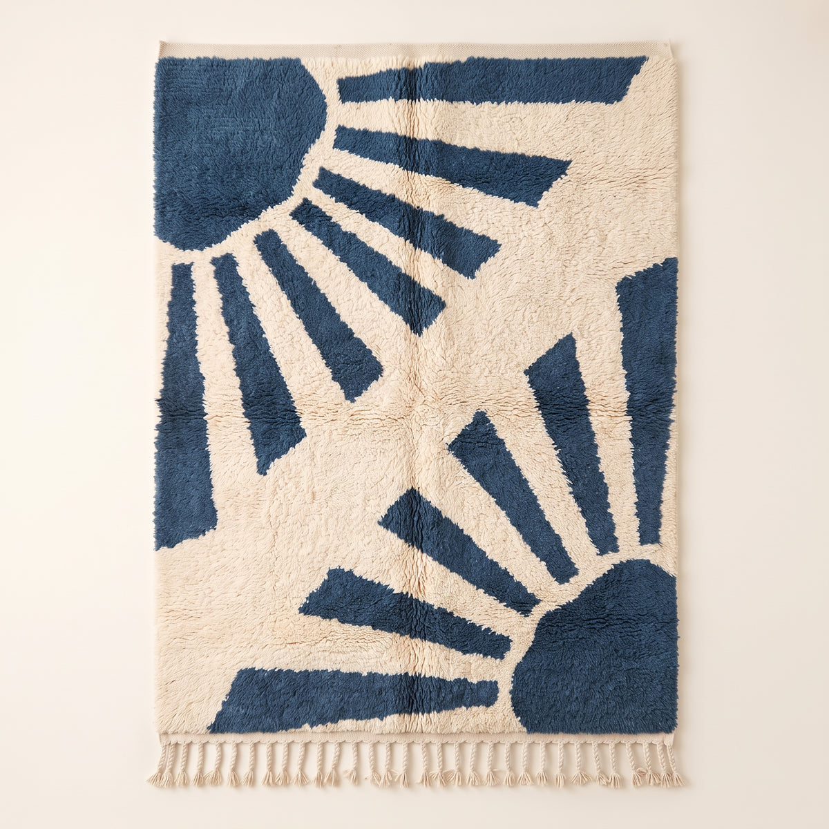 Denim & Ivory Beni Ourain Rug with Radiant Rays motif—full flat view showing sun-like radiating bands and corner geometric shapes