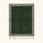 Full view of the Tafukt forest green and ivory Beni Ourain rug with a double border design.