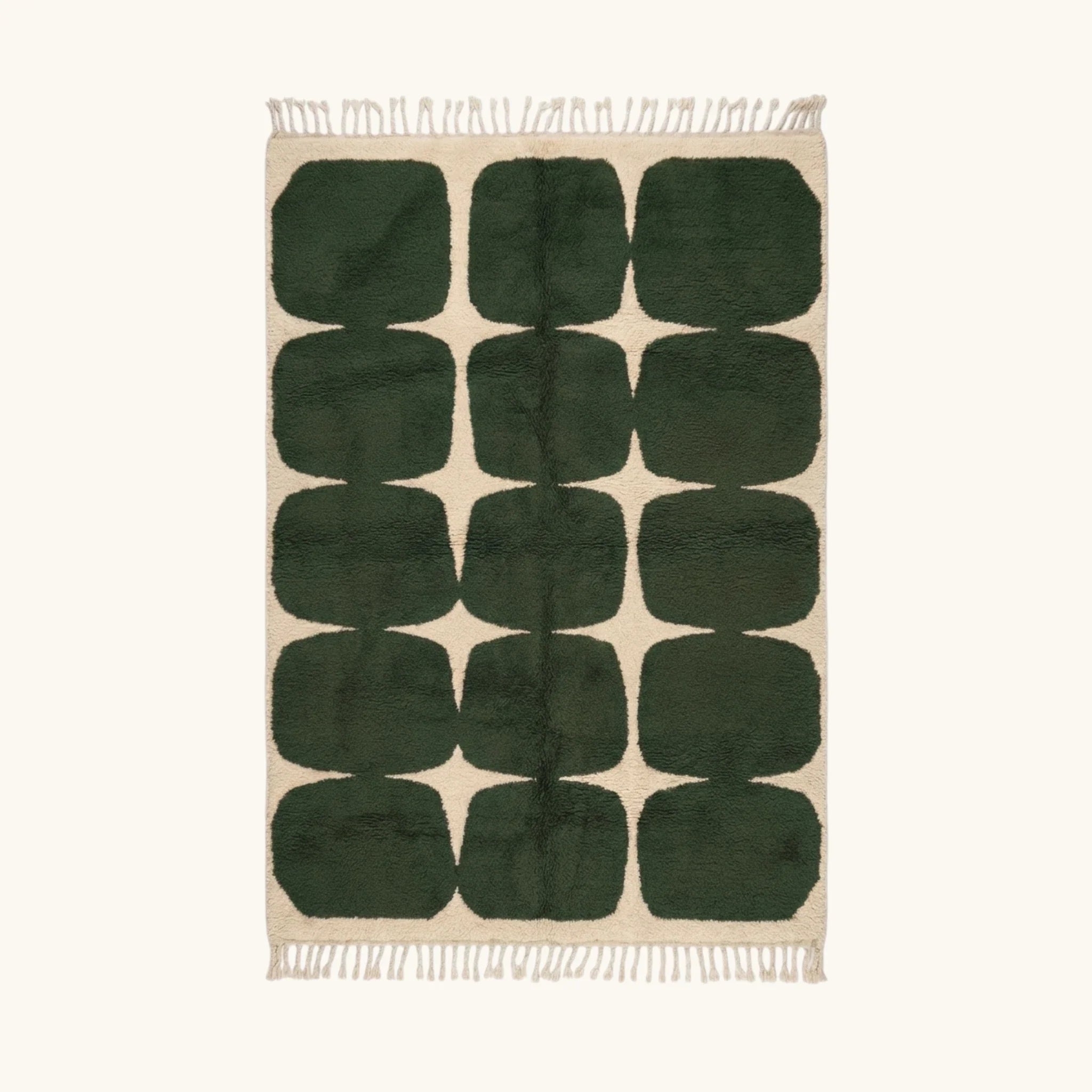 Full view of the Anir forest green and ivory Beni Ourain rug with a rounded grid design.
