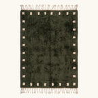 Full view of the forest green and ivory square border Beni Ourain rug.