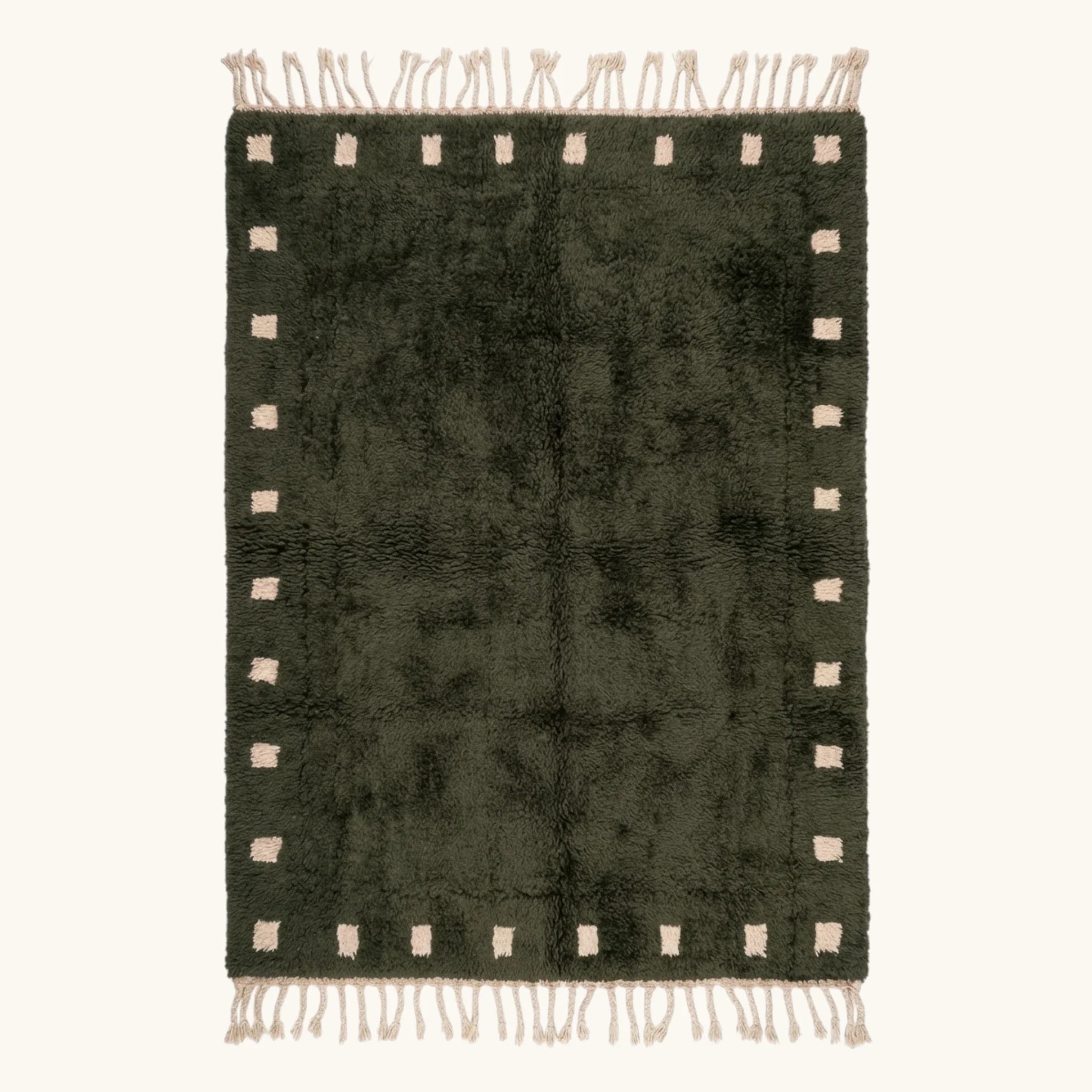 Full view of the forest green and ivory square border Beni Ourain rug.