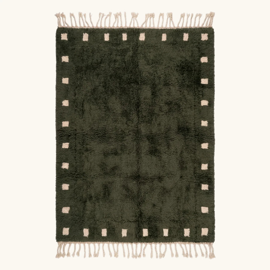 Full view of the forest green and ivory square border Beni Ourain rug.
