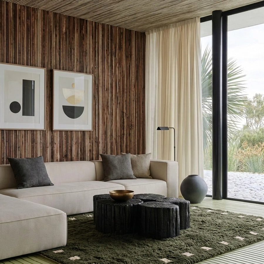 Forest green and ivory square border Moroccan rug styled in a living room.