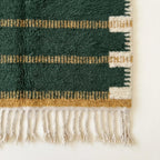 Close-up of the natural Atlas wool texture on the Azru rug.