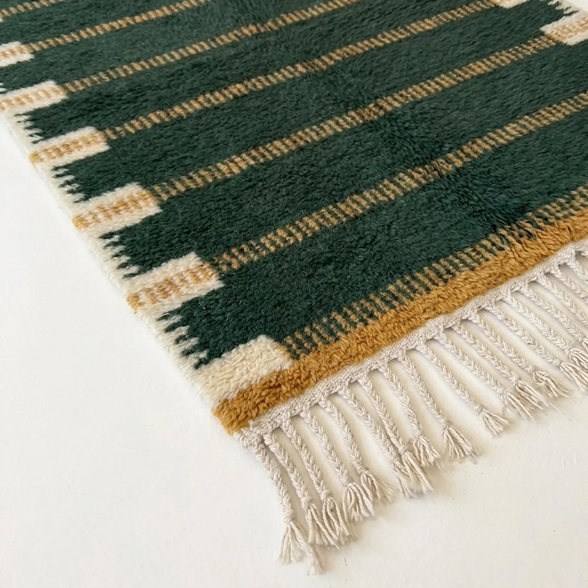 Fringe and edge detail of the Azru hand-knotted rug.