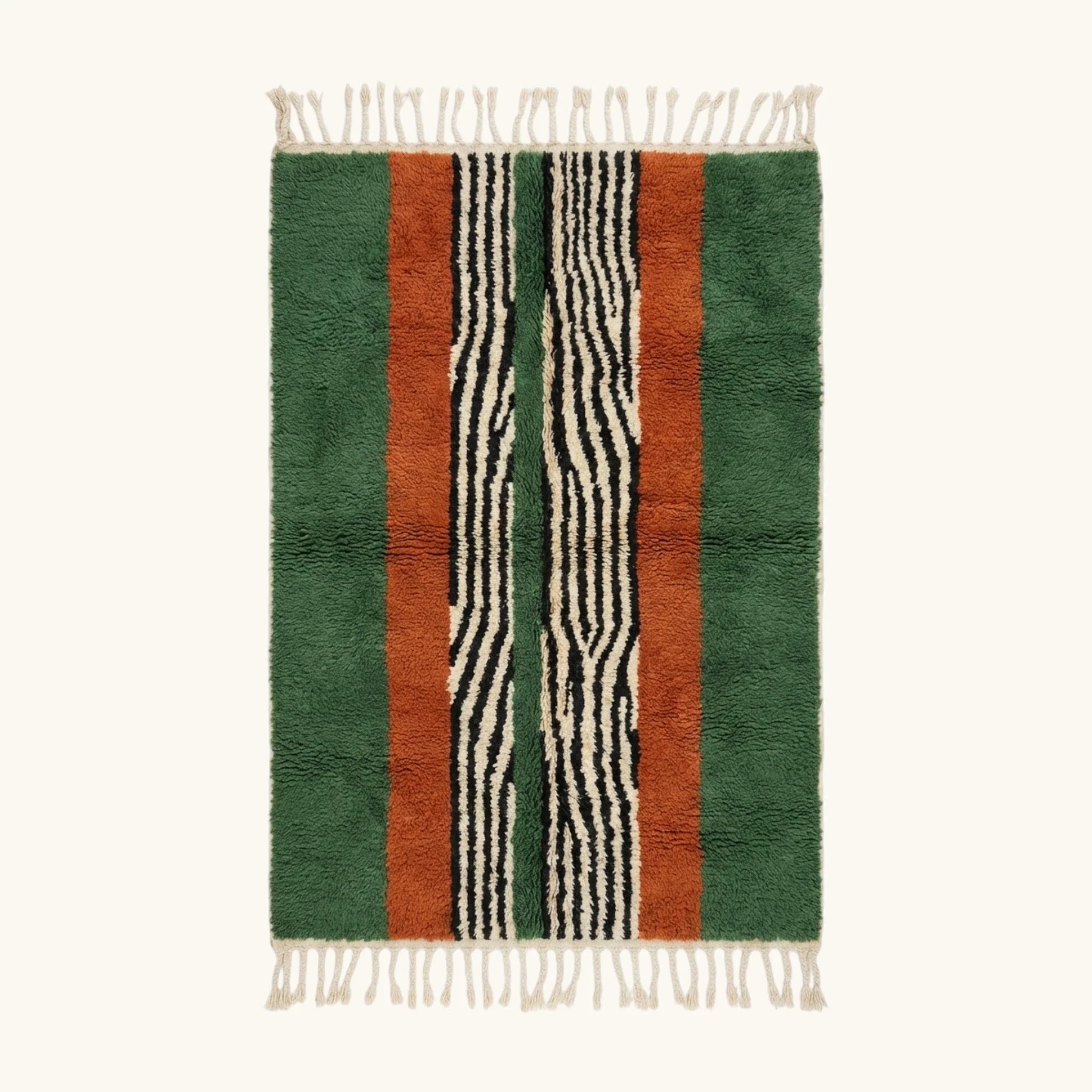 Full view of the Tanit forest green, terracotta, ivory and black Beni Ourain rug with a central stripe design.