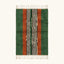 Full view of the Tanit forest green, terracotta, ivory and black Beni Ourain rug with a central stripe design.