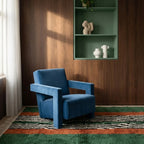Tanit forest green, terracotta, ivory and black Beni Ourain rug styled in a refined living room.