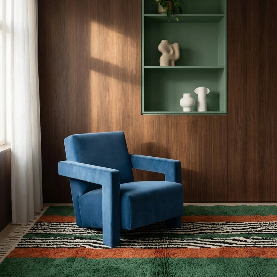 Tanit forest green, terracotta, ivory and black Beni Ourain rug styled in a refined living room.