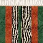 Close-up of the natural Atlas wool texture on the Tanit rug.