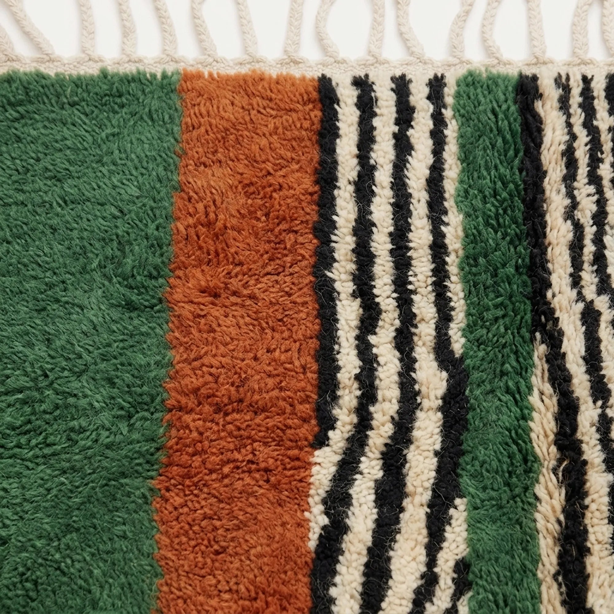 Fringe and edge detail of the Tanit hand-knotted rug.