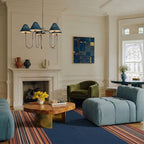 Navy Zanafi Kilim rug Foum Zguid with bordered field, lifestyle living room view