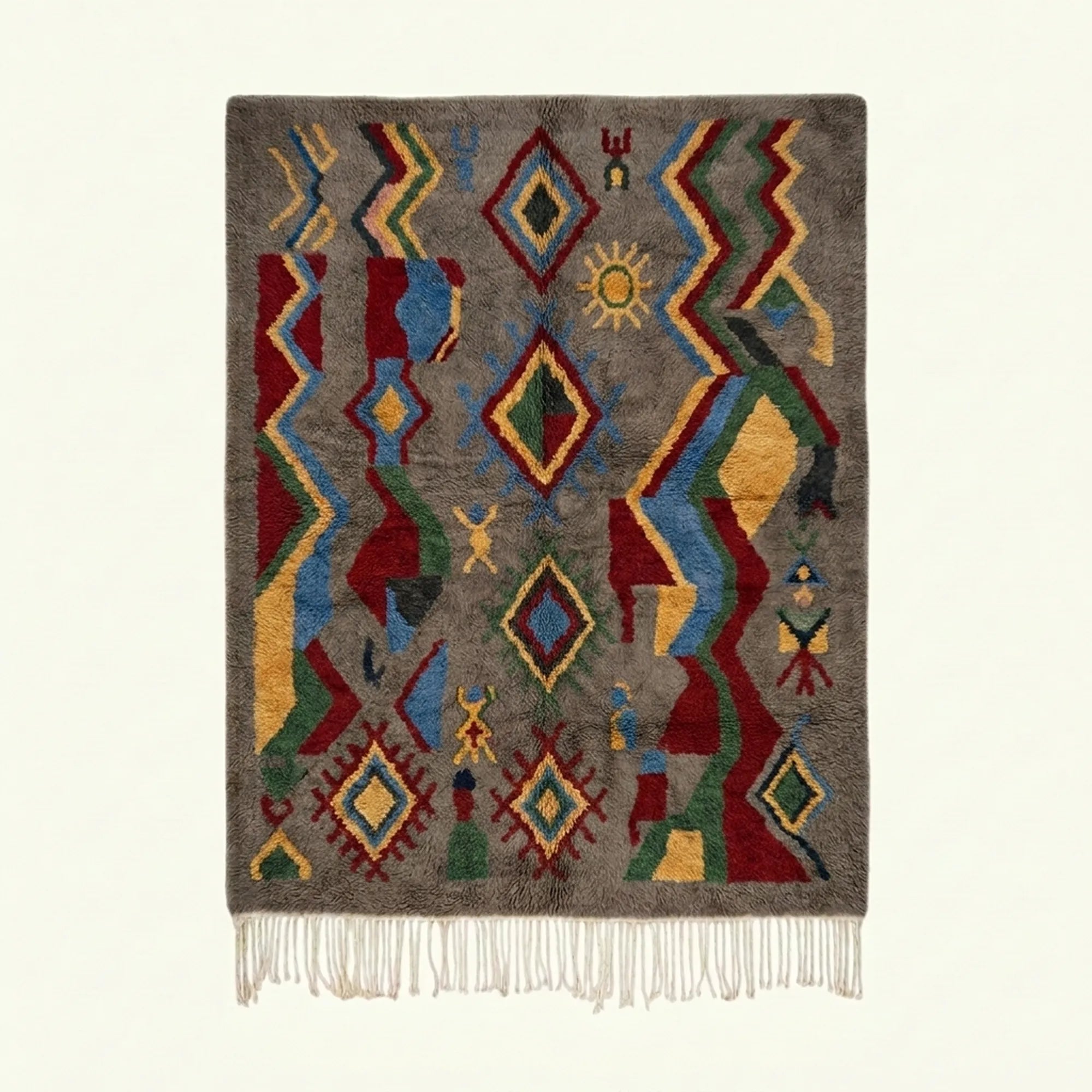 Full view of the Abridan Boujaad rug in gray, blue, red, green and ochre with scattered diamonds and zigzag symbols
