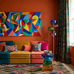 Tazallit Boujaad rug styled in a living room with its multicolor diamond and wavy line design visible