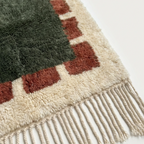 Green and rust Beni Ourain rug detail