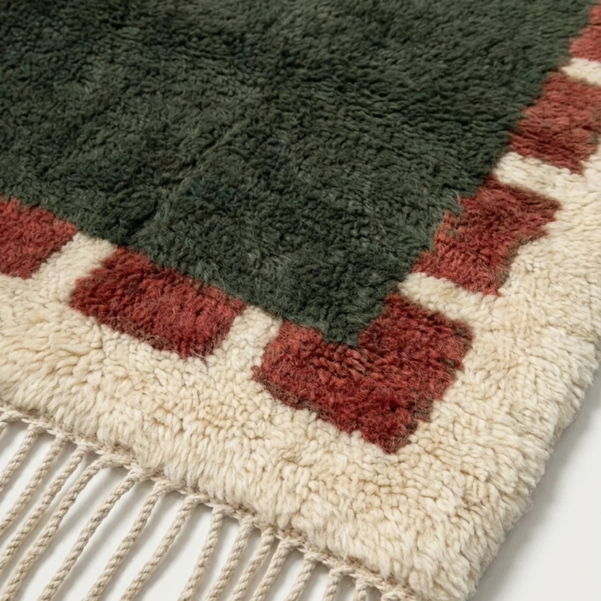 Green and rust Beni Ourain rug detail