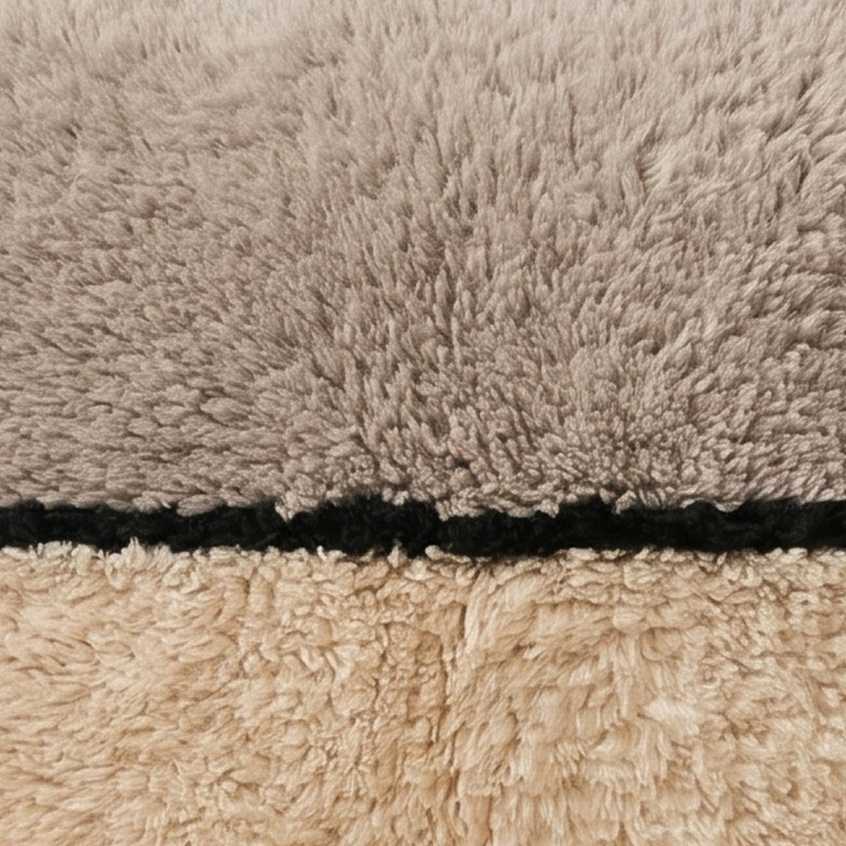 Close-up of the two tones pattern on the Tassa Moroccan wool pillow