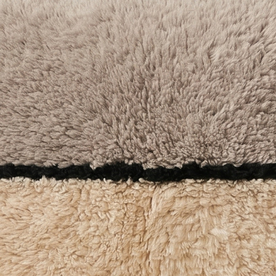 Close-up of the two tones pattern on the Tassa Moroccan wool pillow