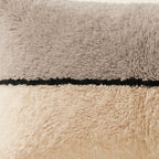 Side view of the Tassa Moroccan pillow showing its grey and cream wool pile