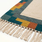 Ivory, teal and rust Zanafi rug Ighir with color-block border design, border and fringe detail