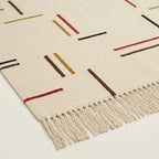 Ivory Zanafi Kilim rug Irherm, dash motif and fringe detail