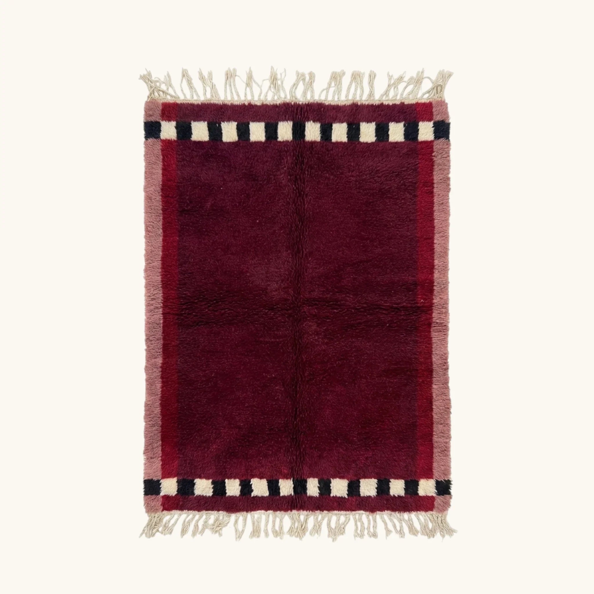 Itran burgundy Beni Ourain rug with checkered border motif, full view