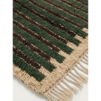 Hand-tied fringe and wool pile detail of the Itri green rug.