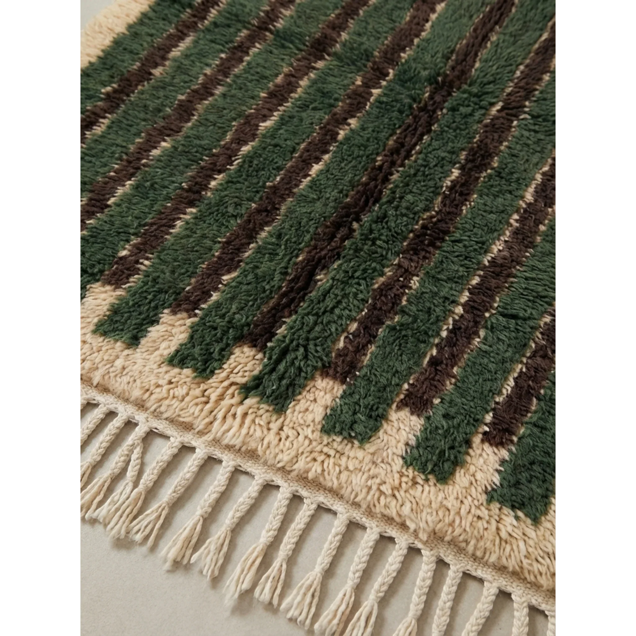 Natural wool texture detail of the Itri green Beni Ourain rug.