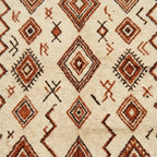 Ivory Azilal rug Adrar with rust diamond pattern, fringe detail