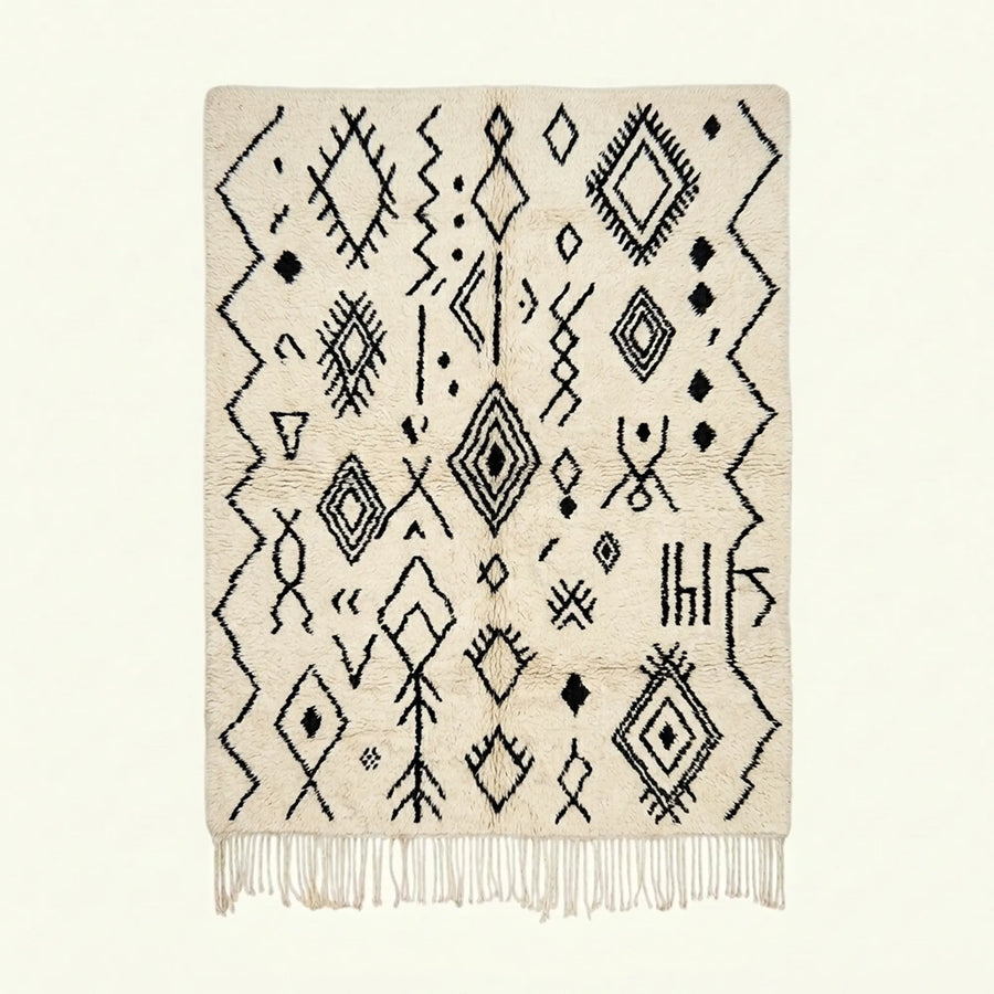 Ivory Azilal rug Afelki with black tribal pattern, full rug view