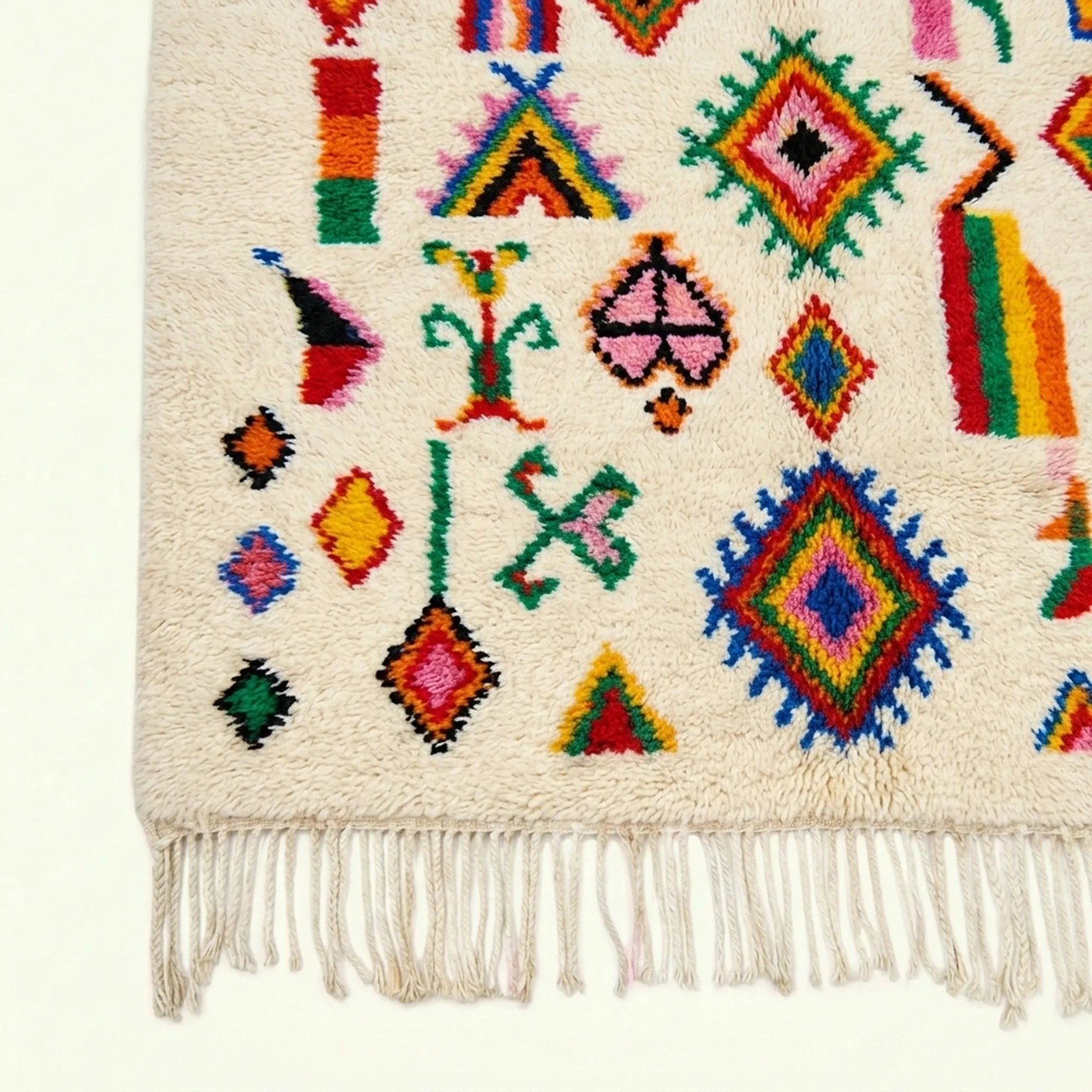 Ivory Azilal rug Afella with vivid multicolor symbols, border detail