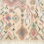 Ivory Azilal rug Amarg with pastel zigzag symbols, wool texture detail