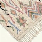 Ivory Azilal rug Amarg with pastel zigzag symbols, border detail