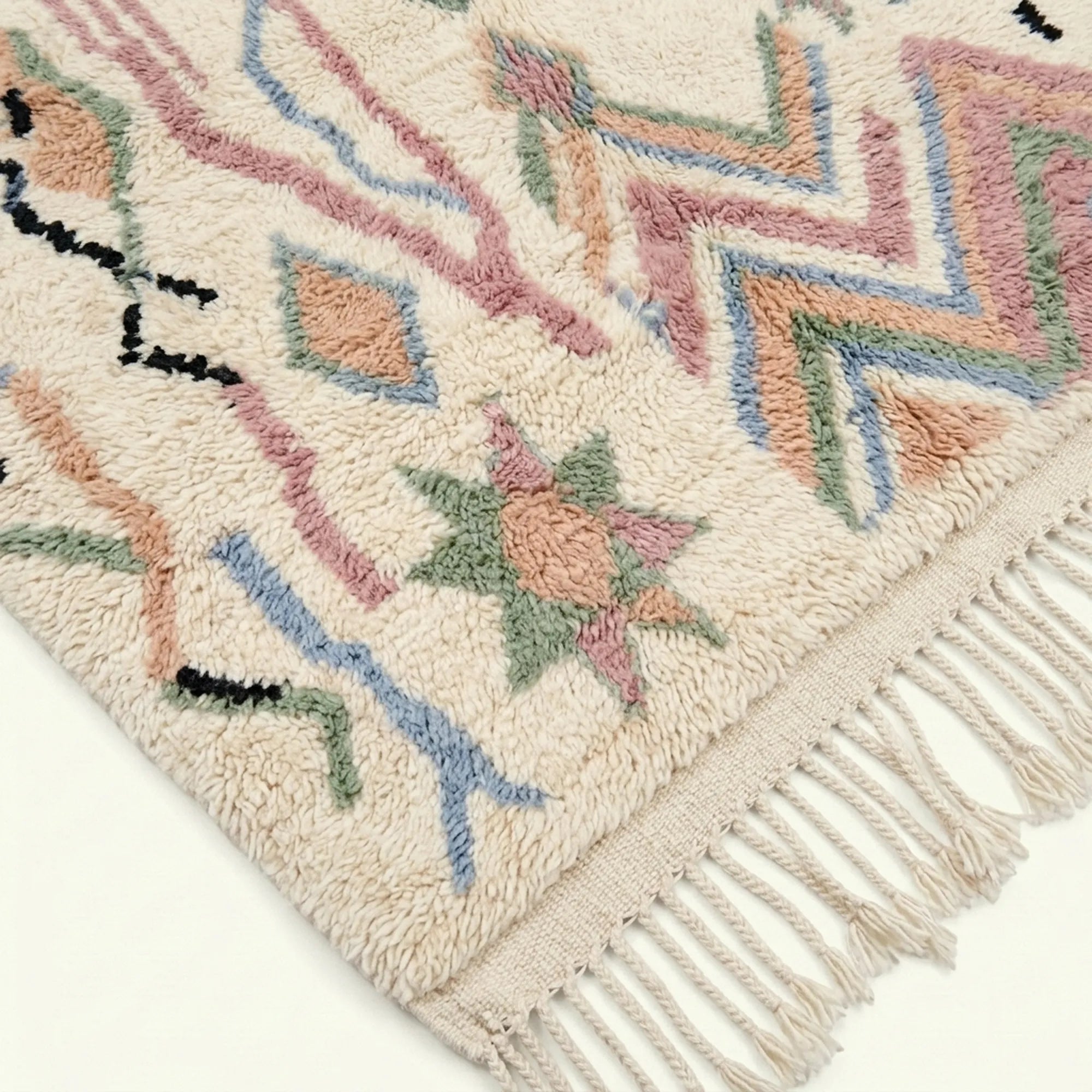 Ivory Azilal rug Amarg with pastel zigzag symbols, border detail