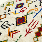 Ivory Azilal rug Amayas with abstract symbol pattern, pattern detail