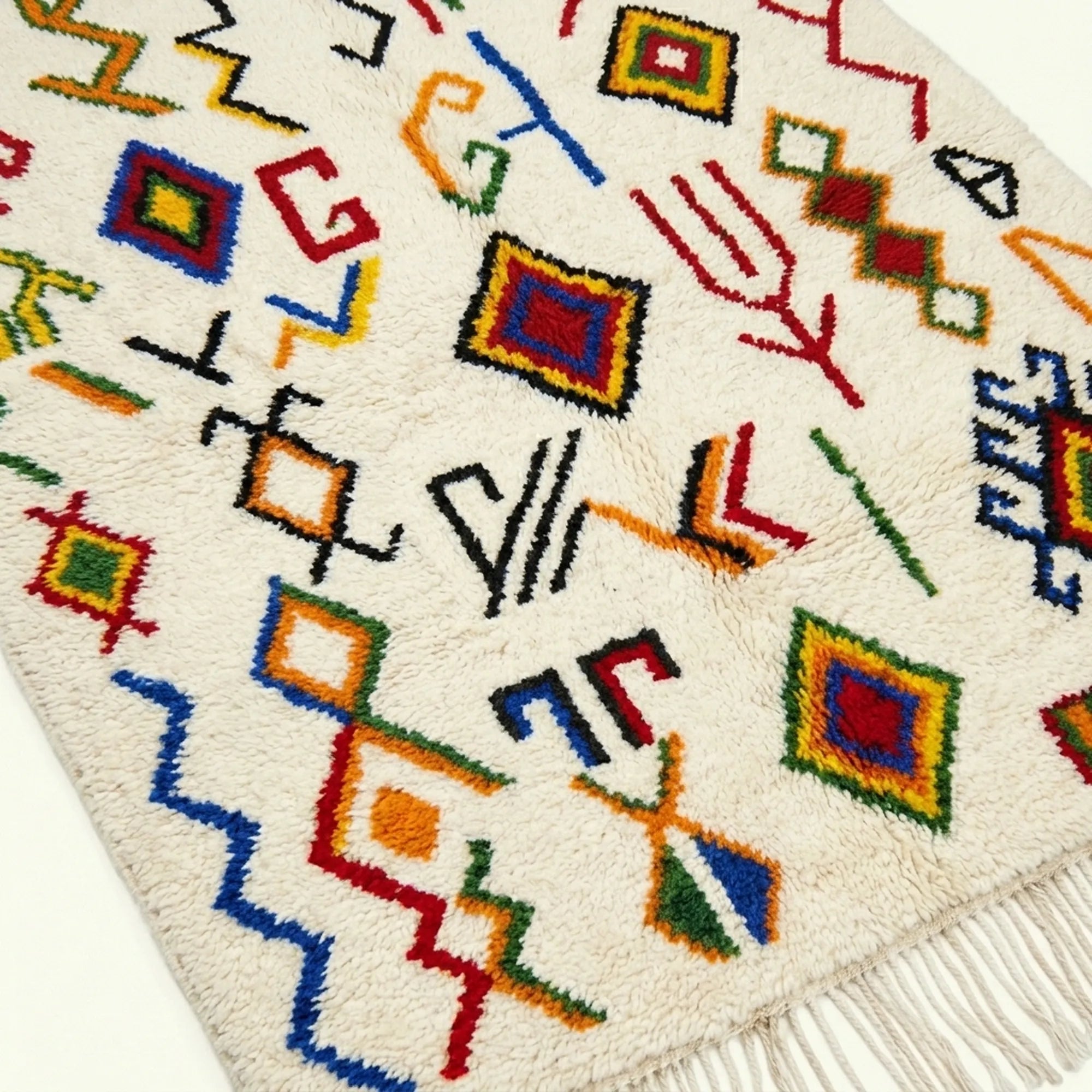 Ivory Azilal rug Amayas with abstract symbol pattern, wool texture detail