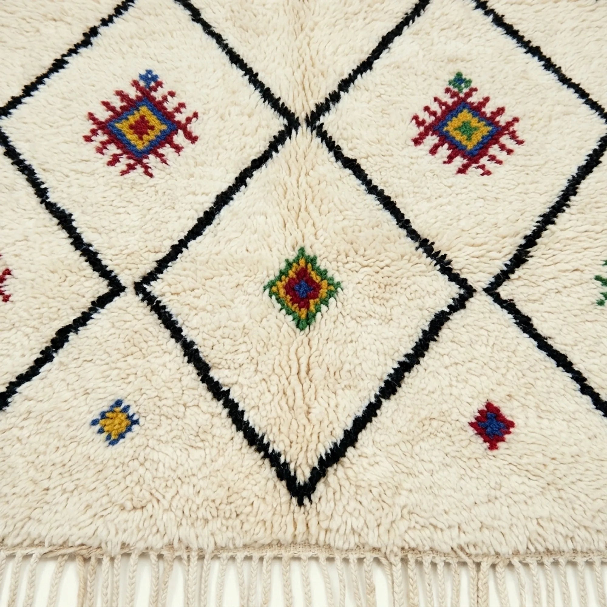 Ivory Azilal rug Asafu with black grid symbols, border detail