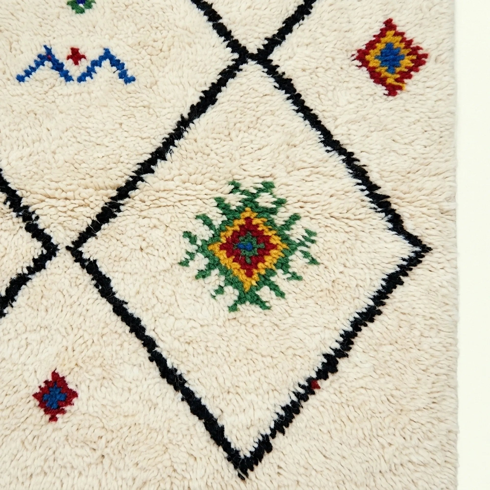 Ivory Azilal rug Asafu with black grid symbols, craftsmanship detail