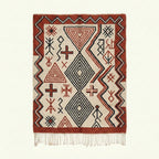Ivory Azilal rug Awal with rust tribal geometry, full rug view