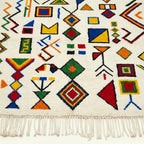 Ivory Azilal rug Azwaw with multicolor symbol pattern, fringe detail