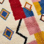 Ivory Azilal rug Izem multicolor color block and diamond pattern close-up