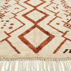 Ivory Azilal rug Izri with rust linear diamond pattern, border detail