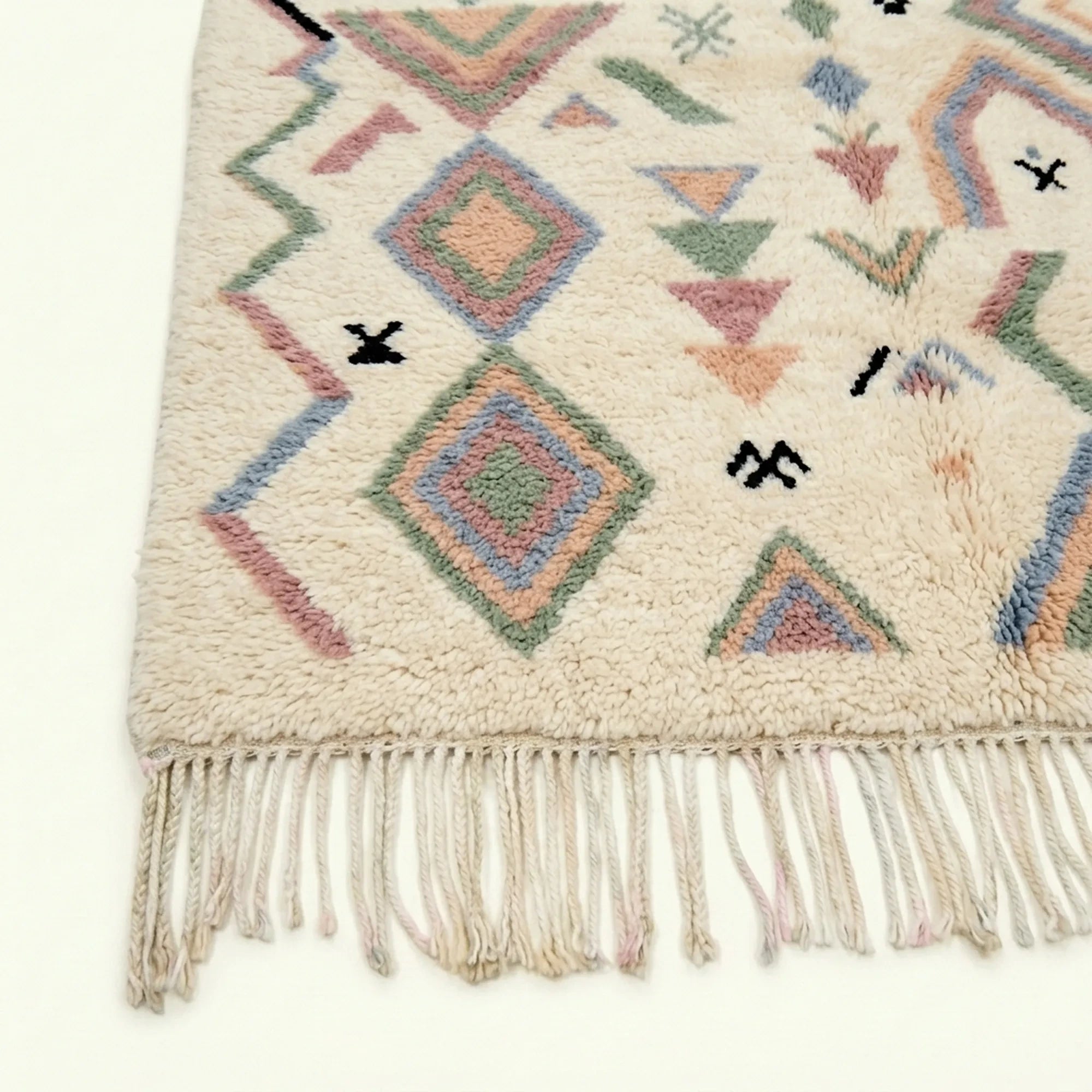 Ivory Azilal rug Tamazla with pastel tribal pattern, craftsmanship detail